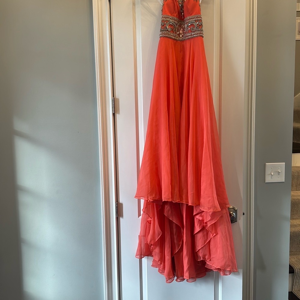 Elegant Coral Gown with Beaded Bodice